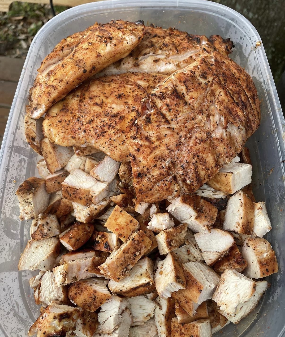 A full batch of smoked and cubed chicken ready to be packed